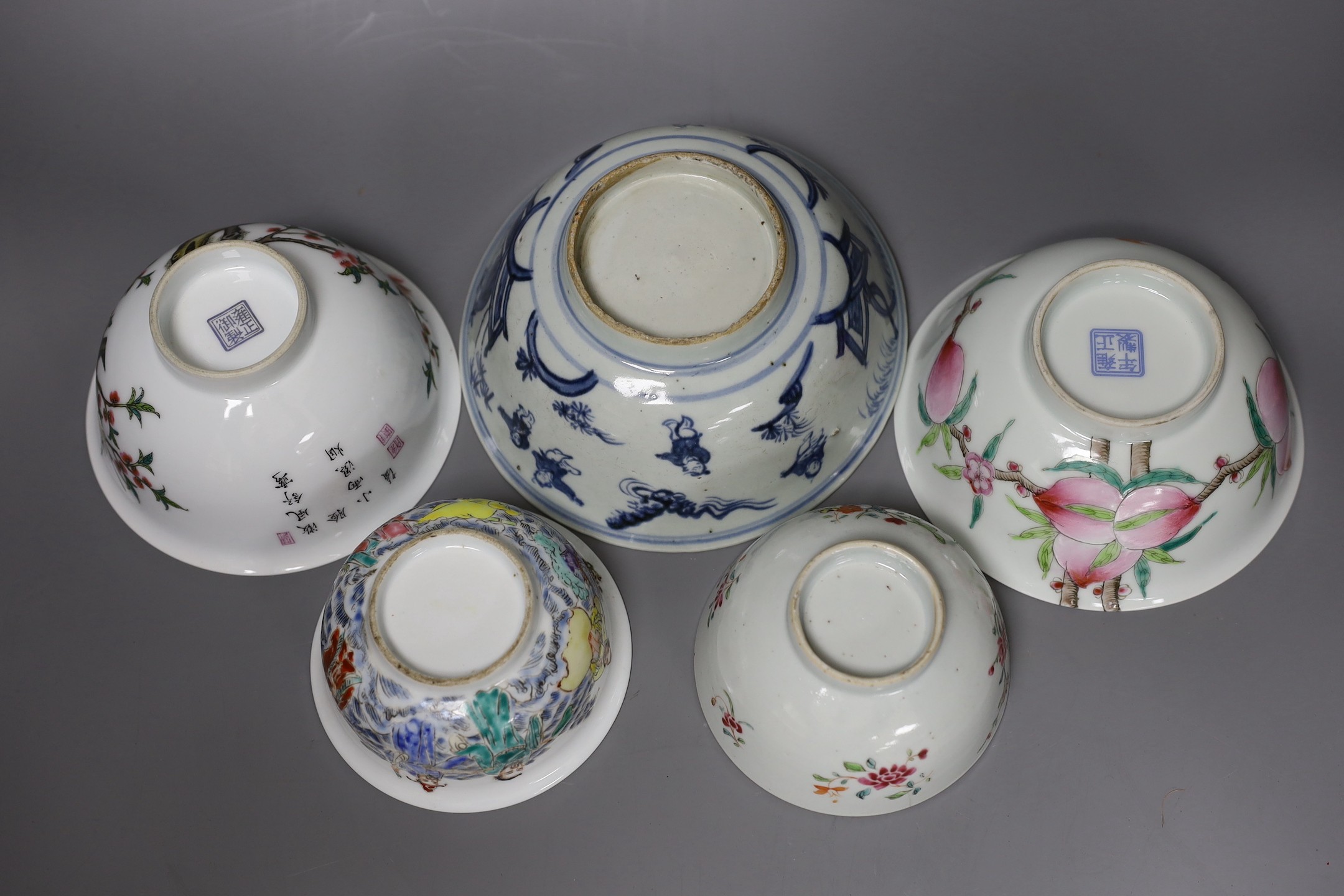 Five Chinese porcelain bowls, one blue and white and three with enamelled decoration, largest 18 cm diameter